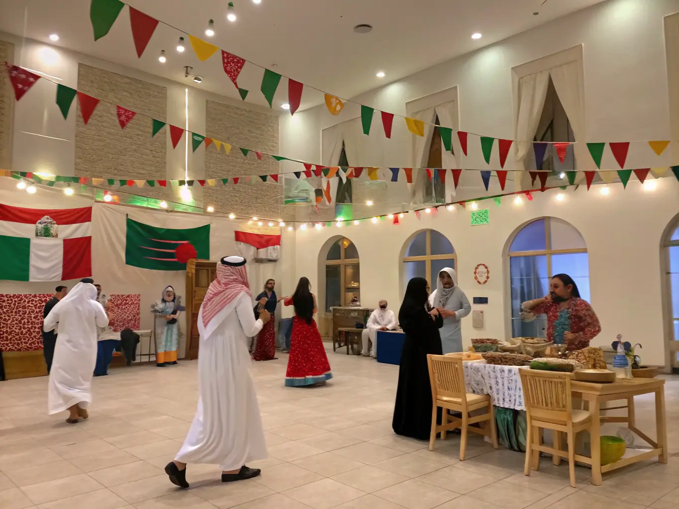 A vibrant photo of participants engaging in a traditional French-German workshop, with cultural artifacts and lively interactions.